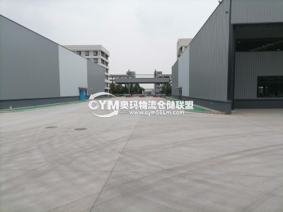 圖片中的中間是車輛進出的大門崗?fù)?>
                        <span id=